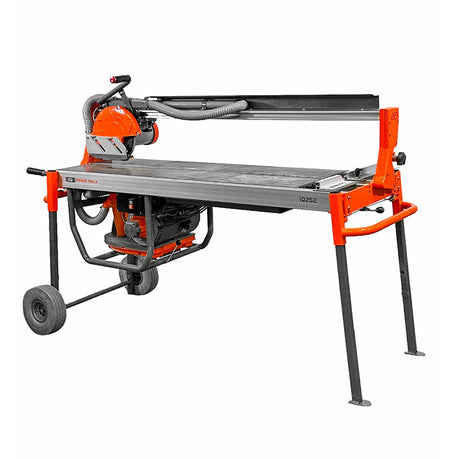iQ252 dry cut rail tile saw angled side view with cutting table and wheels